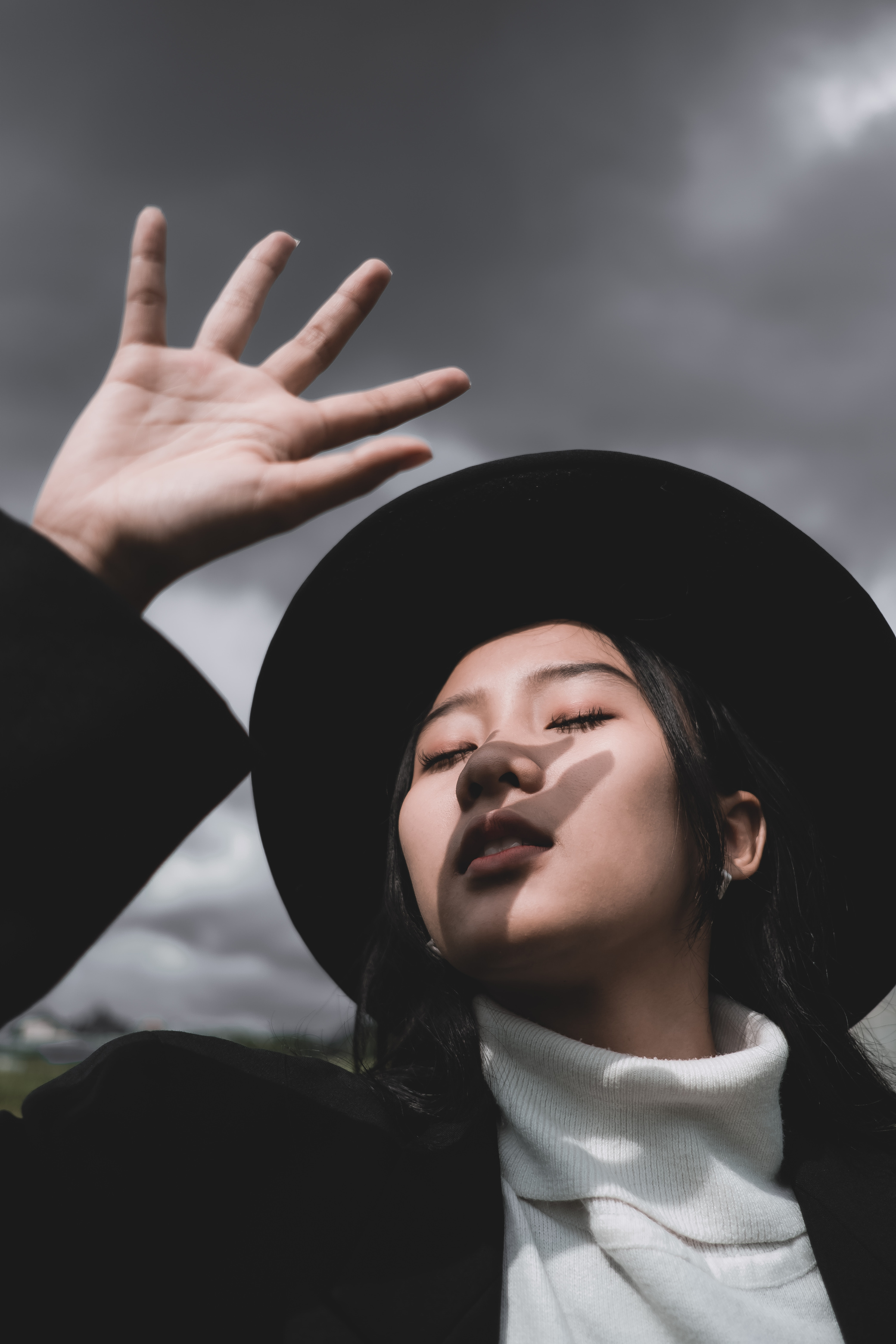 Woman In Black Hat And Coat
